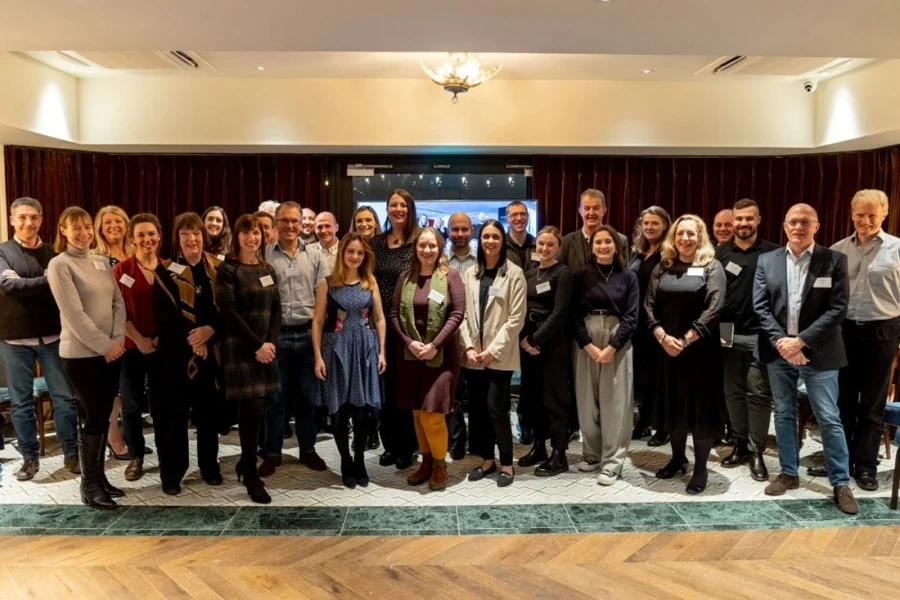 PharmEnable team members gathered together, indicating their collaborative efforts in AI drug discovery.